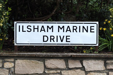 A road sign for Ilsham Marine Drive in Torquay Devon.