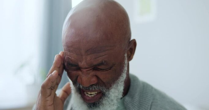 Black man, elderly with headache and pain at home, brain aneurysm and senior care with health and wellness, Disease, cancer and stress with sick patient, migraine for neurology and medical emergency