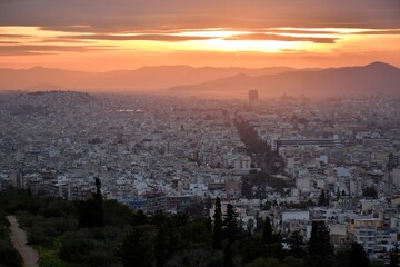 Fototapeta na wymiar sunset over the mountains of Piraeus and Athens, Greece