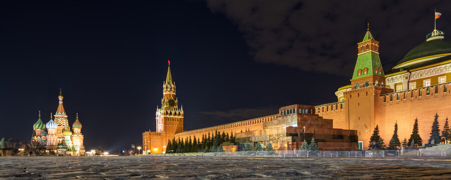Red Square, Moscow, Russia - March 30, 2023. Evening view of the Moscow Kremlin, Lenin's Mausoleum and St. Basil's Cathedral. Sights of Moscow. Wide panorama.