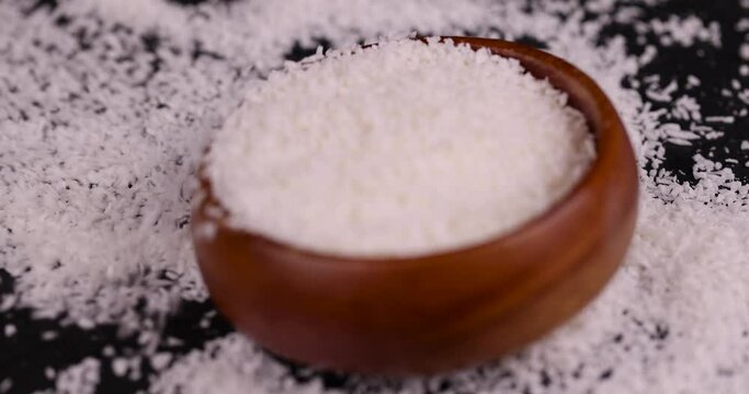 dry white coconut chips for adding to desserts, finely chopped coconut pulp dried in sugar syrup