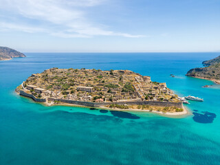 Aerial drone view of an old Venetian fortress island and former Leper colony. Spinalonga, Crete,...