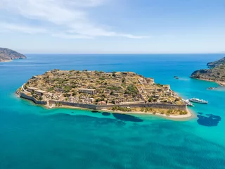 Fotobehang Aerial drone view of an old Venetian fortress island and former Leper colony. Spinalonga, Crete, Greece. © Paopano
