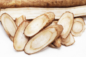 Burdock Root (Gobo) on white background.
