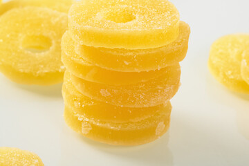 Bright orange and yellow pineapple marmalade jam preserved in glass container