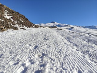 Fototapeta na wymiar Snowy mountain in Spain, Sierra Nevada, Hoya de la Mora