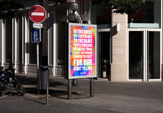 Mockup of customizable sign on sidewalk with no entry sign