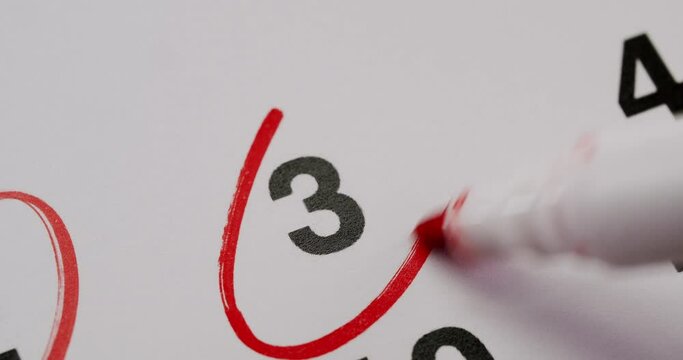 The number 3 is beautifully circled in magenta on a white board, creating an artistic symbol with a stylish font