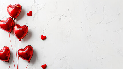 Red heart-shaped balloons on a white background.