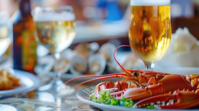 A glass of beer in the background is a plate of crab, shrimp, scallops, lobsters in the restaurant