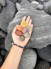 Hand holding chakra healing crystals. Witchcraft, herbal medicine and healing, Magic healing Rock...