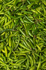 Fresh green pepper on market as background. Top view. Organic texture. Local food and vegetables. Agriculture. Indonesian fresh harvest.
