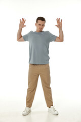 offended frustrated young man on white background. sadness
