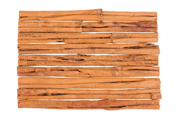 Cinnamon sticks isolated on white background with full depth of field. Top view. Flat lay.