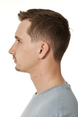 Fototapeta premium handsome young calm man on white background