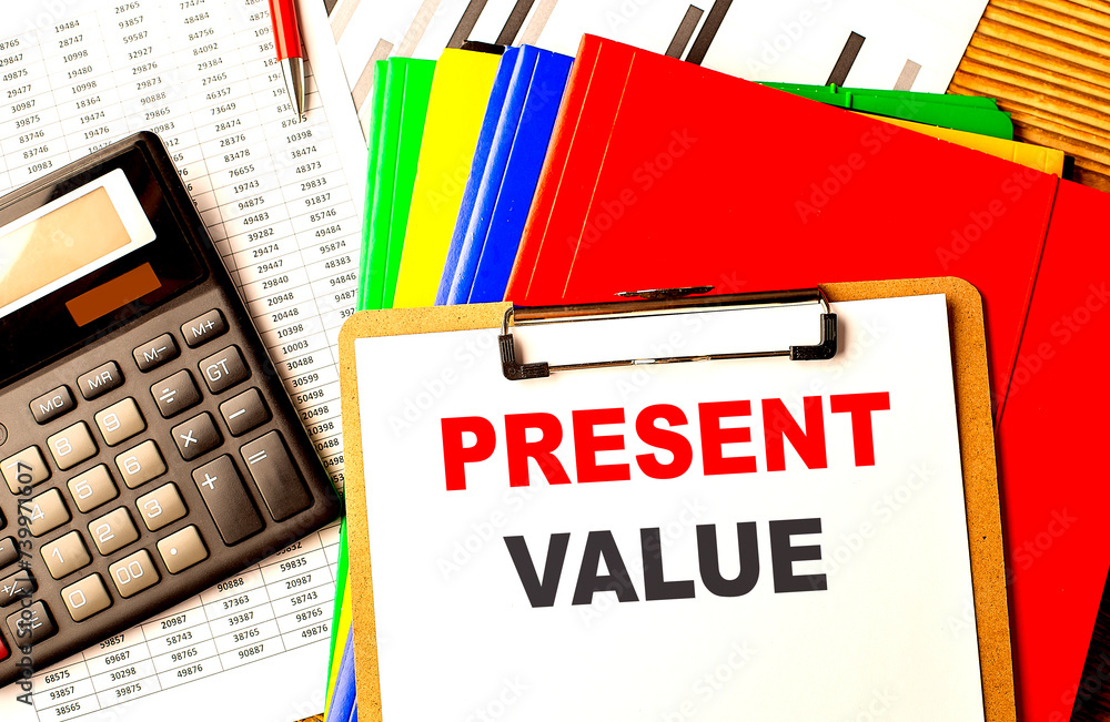 Poster present value text written on paper clipboard with chart and calculator