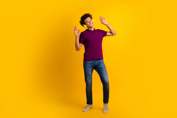Fototapeta na wymiar Photo of cheerful glad man closed eyes wear trendy clothes listen music mp3 player enjoy playlist isolated on yellow color background