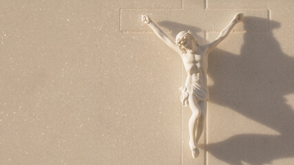 Holy week, Happy Easter Day Sculpture of Holy Jesus Christ Crucified. Panoramic photography with space copy of Jesus carved in marble and cross for religion,. Concept of Jesus crucifie