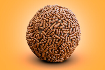 brigadeiro, brazilian sweet snack dessert on a orange background