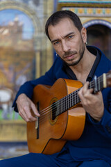 flamenco guitarist playing in the street