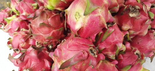 Dragon fruit or Pitaya or Buah naga (Hylocereus undatus) in market
