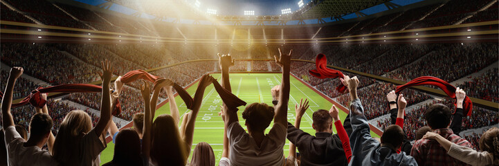 Group of emotional people, football fans cheering up favorite soccer team during live championship...