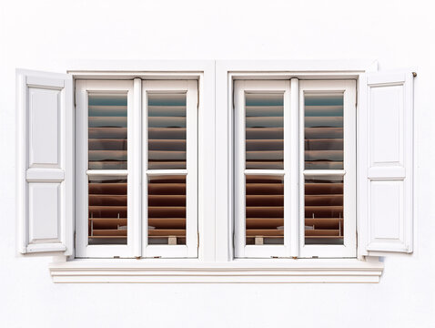 a window with shutters on it