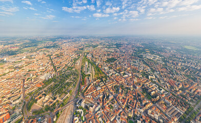 Milan, Italy. Panorama of the central part of the city. Summer day with clouds. Aerial view