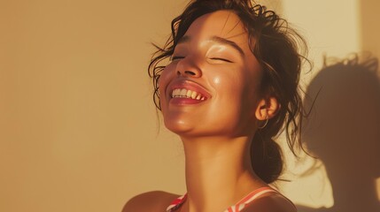 close-up, beauty portrait of a smiling young  woman on beige background with sun shine and shadows , skin care concept, copy space - obrazy, fototapety, plakaty