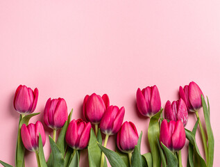 pink tulips on a light background. Mother's day, birthday celebration concept. Postcard. Copy space...
