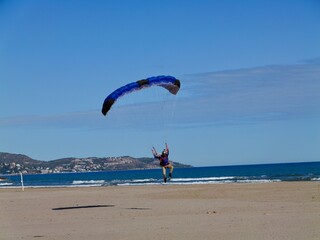Parachutists landing near the Aeroclub de Castelló, El Grao de Castellón, Valencia, Spain
