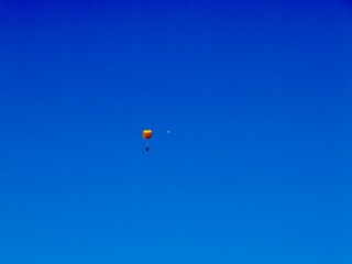 Parachutists flying near the Aeroclub de Castelló, El Grao de Castellón, Valencia, Spain