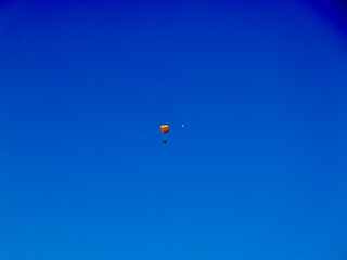 Parachutists flying near the Aeroclub de Castelló, El Grao de Castellón, Valencia, Spain