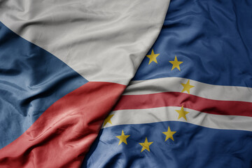 big waving national colorful flag of cape verde and national flag of czech republic.