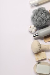 Bath accessories. Flat lay composition with personal care products on white background, space for text
