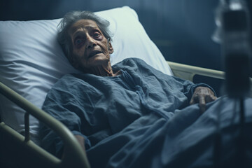 Anxiety, sad senior woman in hospital bed. Old woman mental health struggle on bed, elderly patient care. Worried patient in hospital room. Elderly healthcare support. Palliative care. - obrazy, fototapety, plakaty