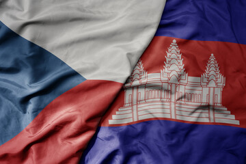 big waving national colorful flag of cambodia and national flag of czech republic.