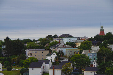 Romantic backstreet, side street or alley in historic old town of Portland, Maine with New England style architecture facades, a landmark sightseeing tourist spot in downtown