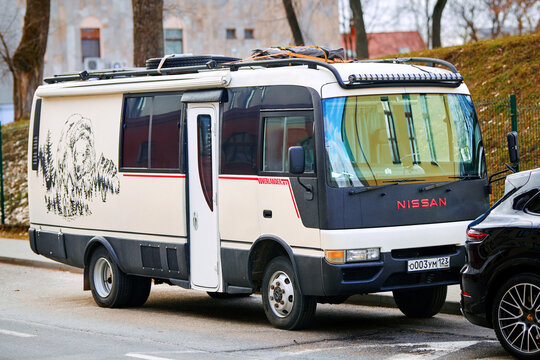 Minsk, Belarus. Feb 18, 2024. Nissan Civilian camper. Nissan Civilian bus motorhome for adventure parked at city street in Minsk. Front view