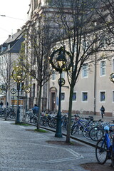  Cobblestone Pavement with Parked Bicycles in Freiburg, Germany - 740054274