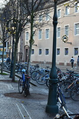  Cobblestone Pavement with Parked Bicycles in Freiburg, Germany - 740054275