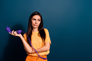 Photo of dissatisfied brunette hair woman stop dialogue talking hold old telephone look empty space...