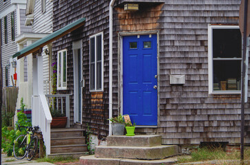 Romantic backstreet, side street or alley in historic old town of Portland, Maine with New England...