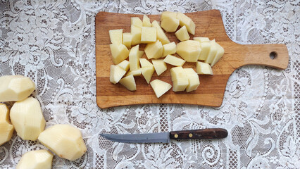 raw potato on the  table