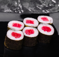 sushi maki rolls with tuna inside