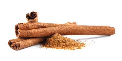 Dry aromatic cinnamon sticks and powder isolated on white