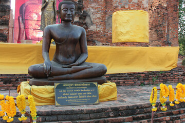 ruined buddhist temple (wat thammikarat) in ayutthaya in thailand 