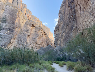 A remote hiking trail through a canyon in Big Bend National Park in Texas. Southwestern backpacking destination in the USA.