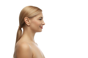 Side view portrait of young, beautiful, tender woman smiling looking away against white studio background. Concept of natural beauty, anti aging, cosmetology, plastic surgery, spa treatments. Ad