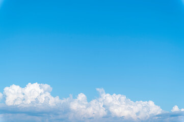 Blue sky and white fluffy tiny clouds background and pattern - 740081070